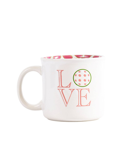 White mug with 'LOVE' text and floral pattern on a white background