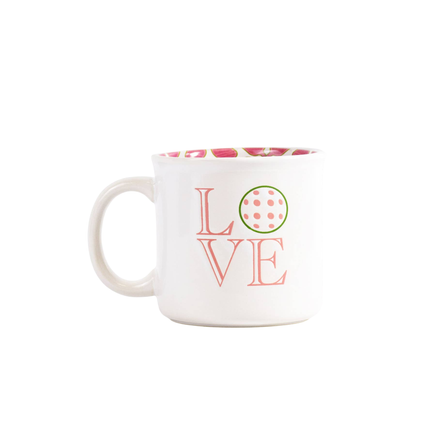 White mug with 'LOVE' text and floral pattern on a white background