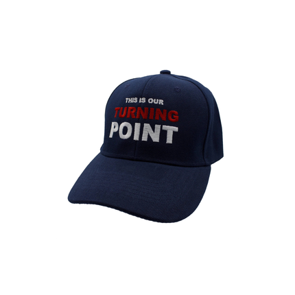 Navy blue cap with text 'THIS IS OUR TURNING POINT' on a white background