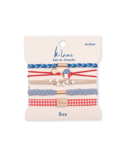 Set of hair ties and bracelets on a branded card with 'klari' branding.