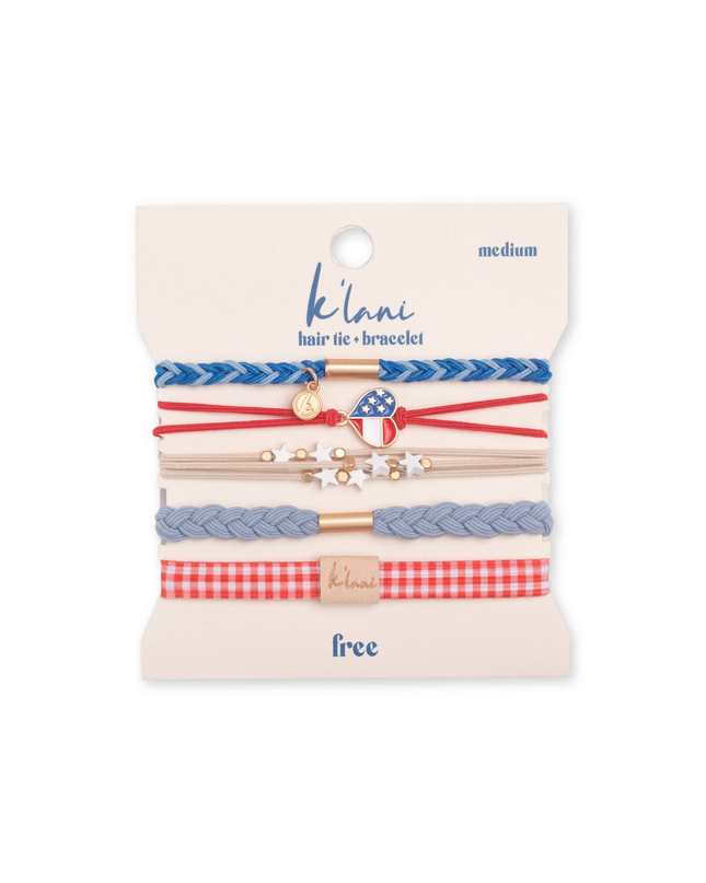 Set of hair ties and bracelets on a branded card with 'klari' branding.