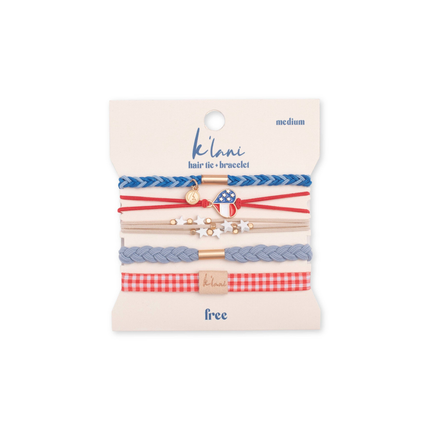 Set of hair ties and bracelets on a branded card with 'klari' branding.