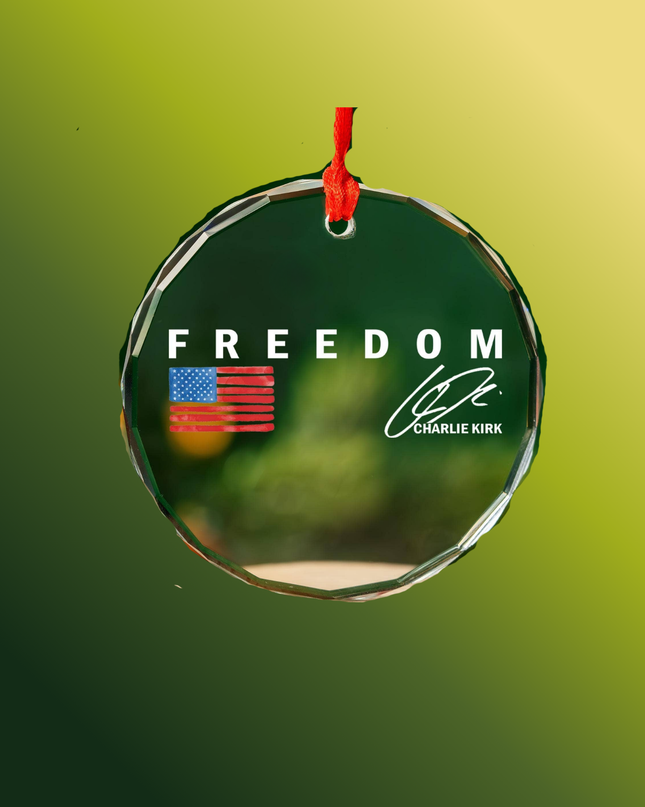 Circular ornament with 'Freedom' text and American flag on a green background