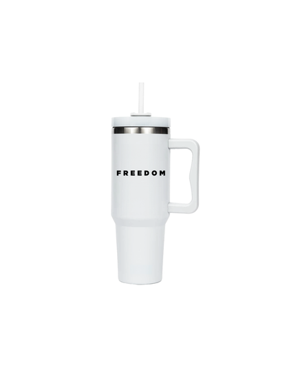 White mug with handle and 'FREEDOM' text on a white background