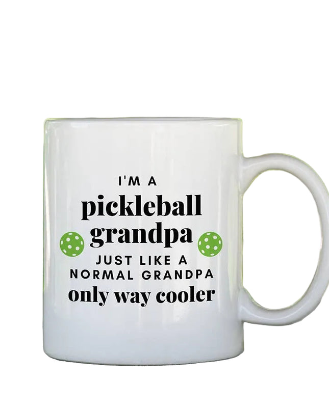 White mug with text 'I'm a pickleball grandpa just like a normal grandpa only way cooler' on a white background