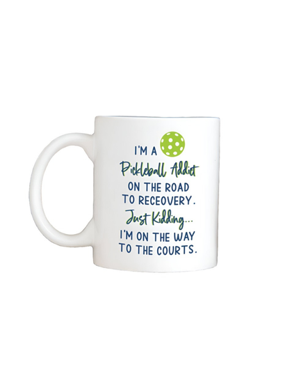 White mug with pickleball-themed text and design on a white background