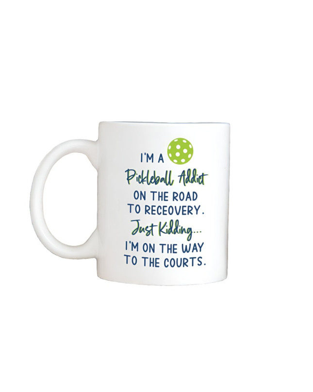 White mug with pickleball-themed text and design on a white background