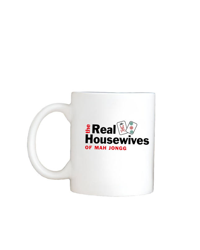 White mug with 'Real Housewives of Mah Jongg' text on a white background