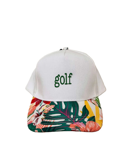 White cap with colorful back and 'golf' text on a wooden surface